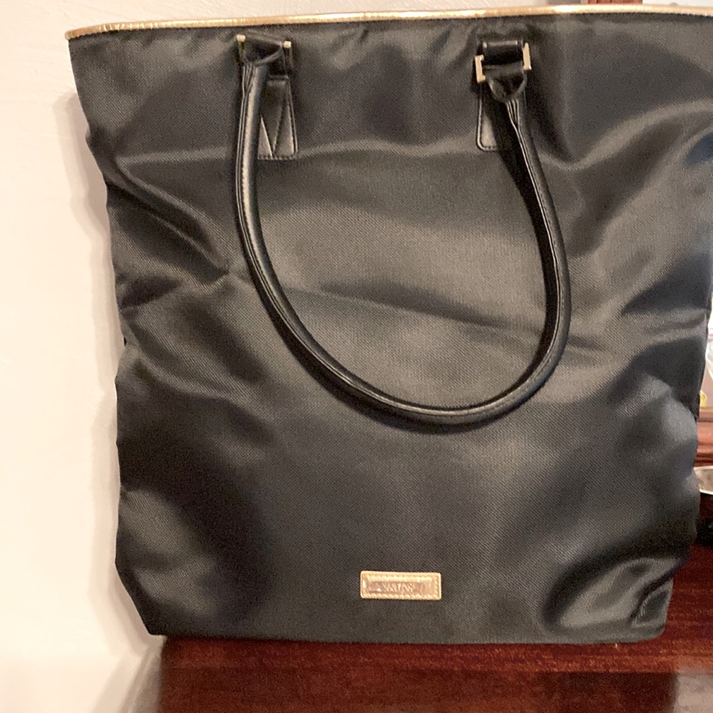 Versace tote bag (new) w/cover bag.             15” tall x 17” wide